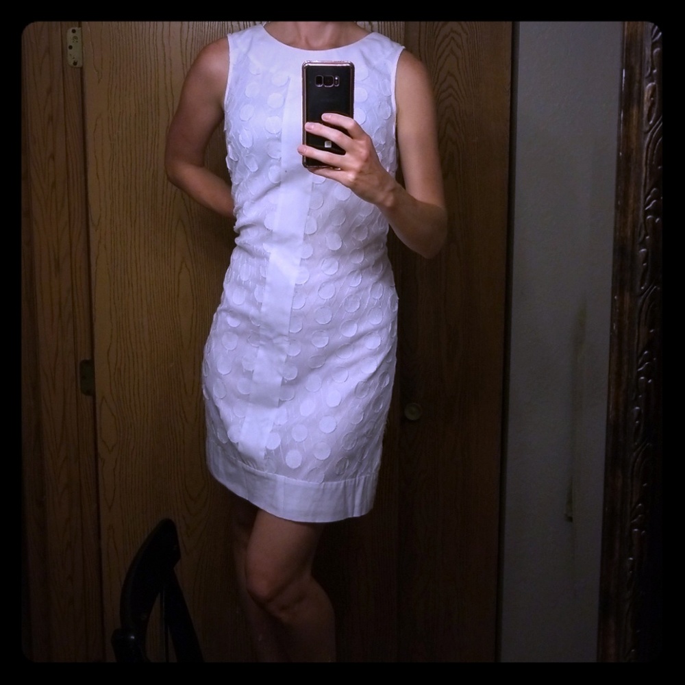 Cache white dress, with 3D dots.